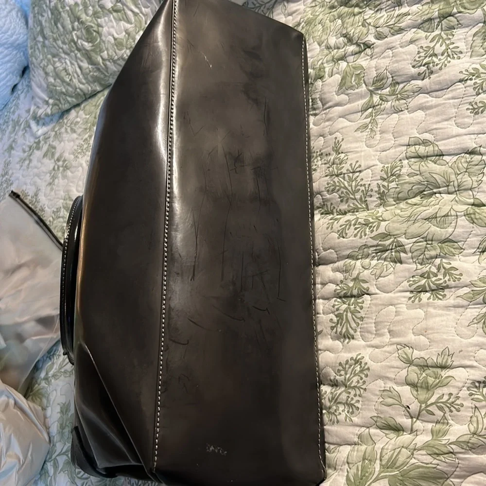 Alberta Di Canio gray leather tote.Approx. 17”wide 14.5 tall expanding width 6”.